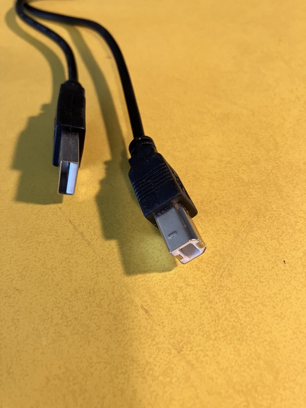 Lot of 3 unusual cords. Car charger cord, USB type B, unknown outlet power cord. gallery