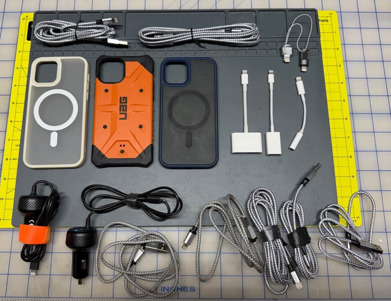 7 USB a to Apple cables, 2 Anker car power adapters, 3 iPhone 12 Pro cases