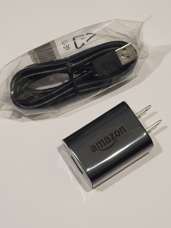 Amazon 9W Original OEM AC USB Power Adapter With Micro USB cable.