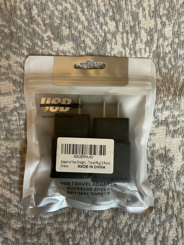 adaptive fast charging travel plug adapter