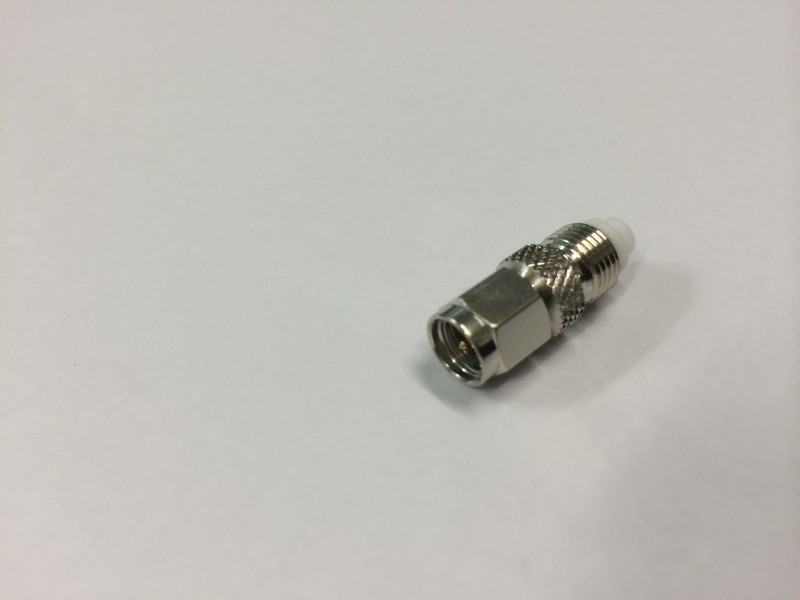 SMA-Male to FME-Female Coaxial Adaptor by DAI-1CHI. Sealed in Original packaging