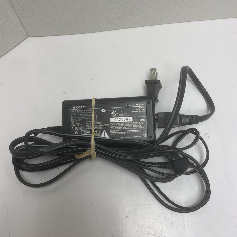 Sony AC Power Adapter AC-LS1A 100-240V 50/60Hz Digital Camera Charger GENUINE