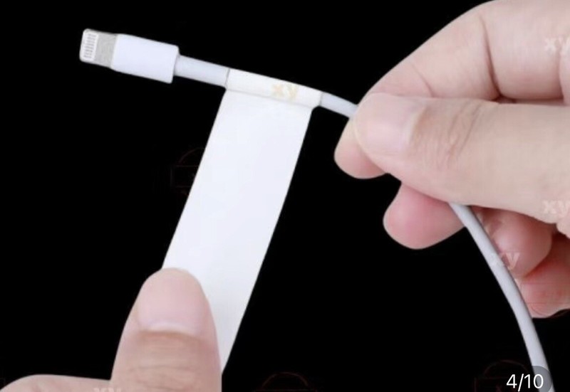 White tape for repairing damaged mobile phone charging and headphone cables gallery