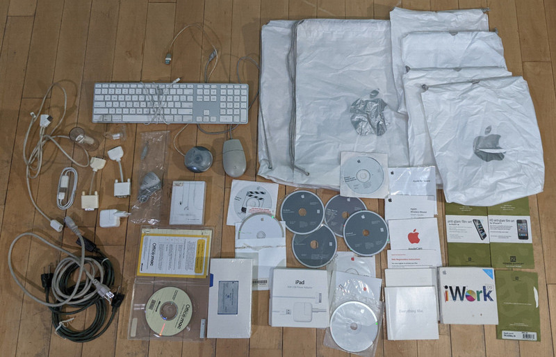 Huge lot of Vintage Apple Accesories and items – Keyboard, Software, Vhs, Bag ++