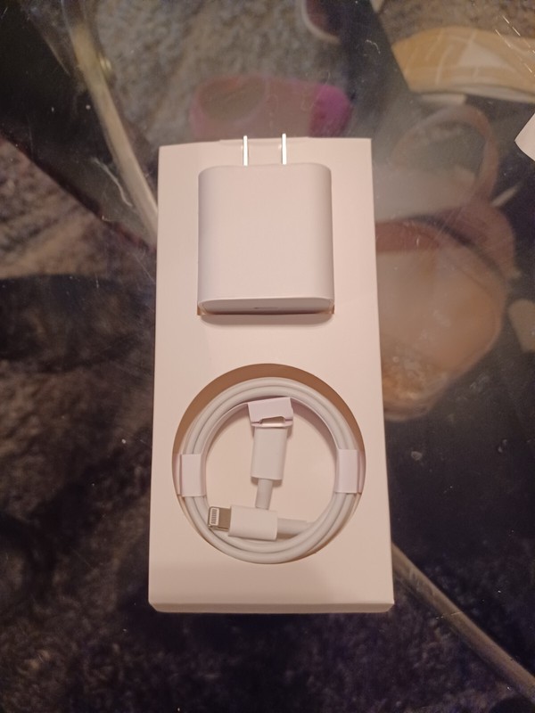 20W FAST CHARGING Power Adapter with IPhone cable included.